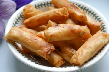 Fried spring rolls or Popiah Goreng, crispy fried spring roll filled with vegetables, meat or prawns, offering a crunchy delight.  Usually served for breakfast or afternoon tea.