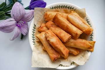 Fried spring rolls or Popiah Goreng, crispy fried spring roll filled with vegetables, meat or prawns, offering a crunchy delight.  Usually served for breakfast or afternoon tea.