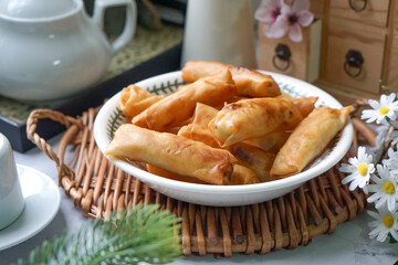 Fried spring rolls or Popiah Goreng, crispy fried spring roll filled with vegetables, meat or...