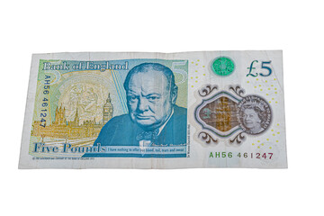 Polymer five pounds banknote from the Bank of England featuring Winston Churchill's portrait, Big Ben clock tower, a quote from his 1940 speech, a transparent window, and security holograms.
