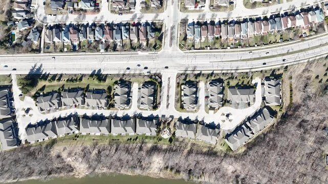 Aerial view of rural Kitchener, Ontario showing cars moving along a road beside scattered homes