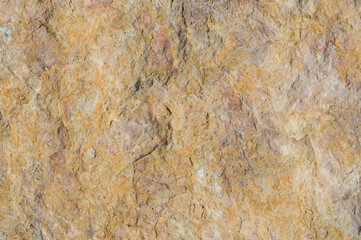 Yellow stone surface background