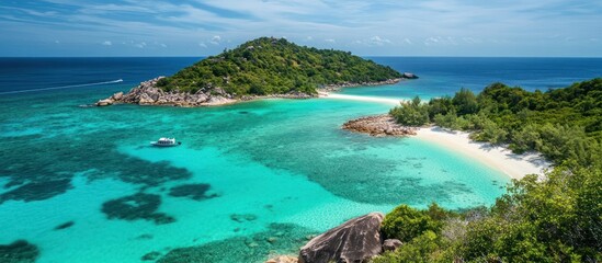 Fototapeta premium A beautiful island beach scene with crystal clear turquoise waters