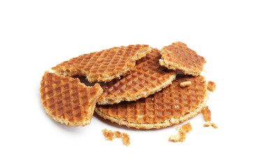 Pieces of tasty round waffles isolated on white