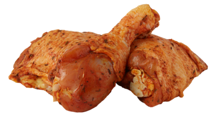 Fresh chicken legs marinated in sauce cut out isolated transparent background