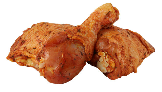 Fresh chicken legs marinated in sauce cut out isolated transparent background
