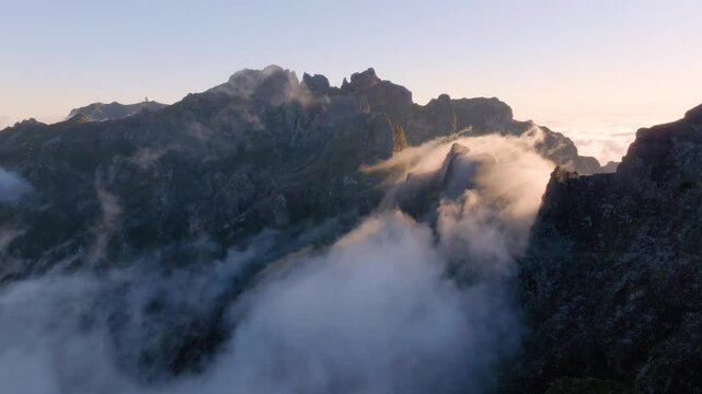 Explore breathtaking Madeira mountains at sunrise with rolling clouds