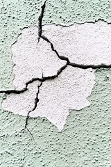 Obraz premium Distressed Wall Surface with Fractured Texture and Faded Paint Finish