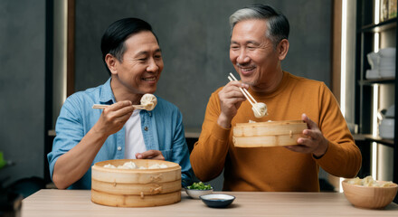 Two asian mature men enjoying dumplings together in a cozy dining setting
