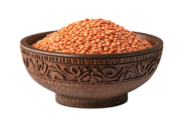 Red lentils in wooden bowl