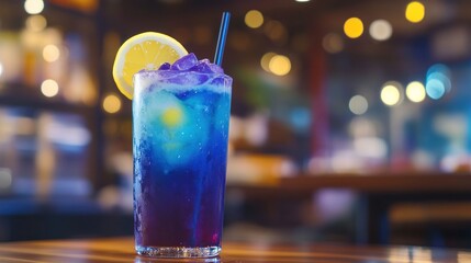Purple and Blue layered cocktail with lemon slice