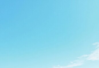 Minimalist clear blue sky background with no clouds, wide copy space for design, clean and calm atmosphere, ideal for banner, website, or presentation