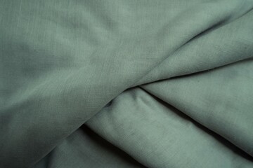 Sage green color viscose fabric texture seamless with beautiful closeup detail fabric. Sample photo of luxury viscose fabric for fabric catalog reference.