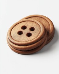 Wooden Buttons with Four Holes on a Light Background Surface