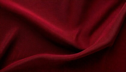 Fototapeta premium Maroon fabric background with a slightly wavy texture