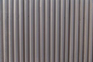 Obraz premium Industrial metal wall panels urban warehouse textured surface modern environment close-up view contemporary design