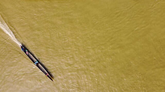 Aerial Majesty of Quibd&oacute;: River, Faith, and Rainforest. Drone views of Quibd&oacute;, Choco, Colombia, featuring the Atrato River, boats, rainforest, and the iconic cathedral. A vibrant mix of nature.