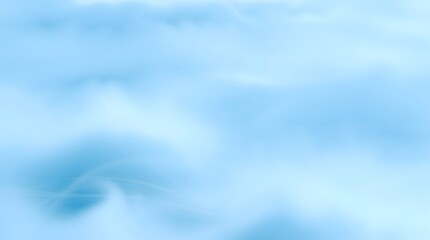 Obraz premium A light blue background with soft, abstract shapes. It could represent clouds, a blurred sky, or a gentle gradient 
