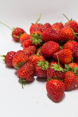 Freshly harvested strawberries farmers market food photography bright environment close-up view nature's bounty