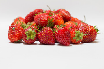 Fresh strawberries harvested farm field food photography natural lighting close-up culinary delight