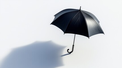 Floating umbrella with shadow underlay on clean white surface, ideal for web and digital uses focused on safety