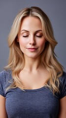 Naklejka premium Calm woman with closed eyes