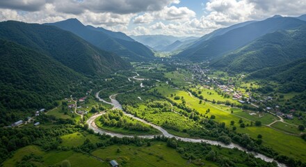 Fototapeta premium Aerial View of Lush Green Valley with Winding River