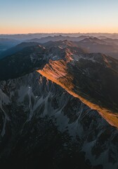 Aerial View of Mountain Range at Sunset