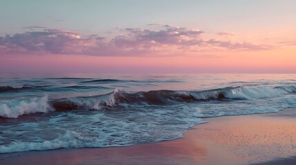 Obraz premium Tranquil ocean sunset over a beach. Gentle waves meet the shore, painted with soft, pastel hues of pink and purple. A serene, peaceful scene