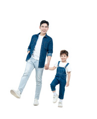 Fototapeta premium Full body image of Asian father and son walking and posing on white background