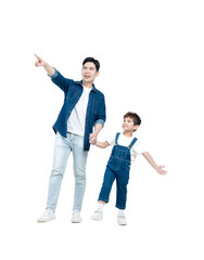 Full body image of Asian father and son walking and posing on white background
