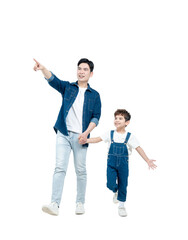 Full body image of Asian father and son walking and posing on white background