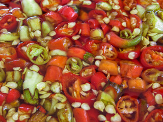 Spicy chili pepper infusion culinary kitchen food photography vibrant environment top-down view...