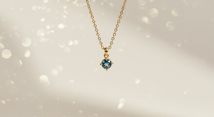 Delicate Gold Necklace with Blue Gemstone Pendant