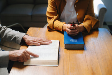 Christians are congregants join hands to pray and seek the blessings of God