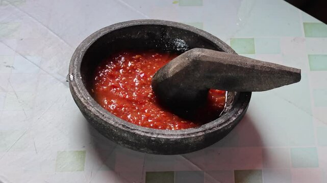 Ingredients for making Chili Sambal, fried hot red chili sauce, process making sambal