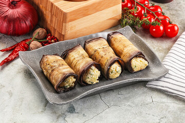 Baked eggplant roll with cheese