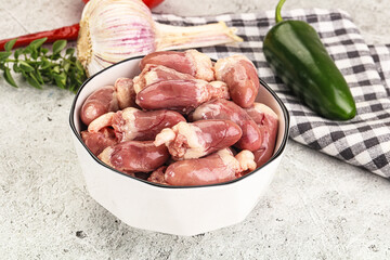 Fresh raw chicken hearts in the bowl
