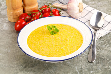 Vegetarian corn cream soup served parsley