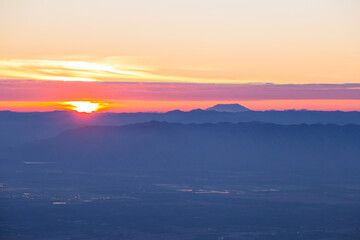 Sunrise over mountains nature landscape tranquil atmosphere serene environment wide view capturing dawn beauty