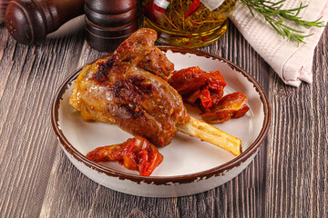 Baked lamb shank with vegetables