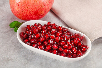Ripe sweet red pomegranate seeds