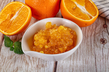 Sweet orange jam in the bowl