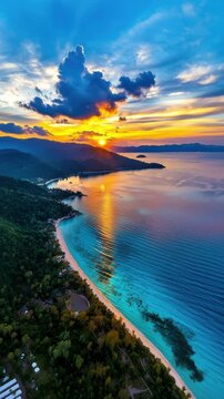 Witness the stunning sunset illuminating the tranquil waters and lush coastline. The vibrant colors blend beautifully, creating a serene moment of nature's beauty.