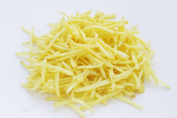 Ginger chopped on white background.