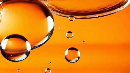 Abstract liquid motion with water droplets on orange background - Powered by Adobe