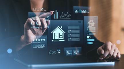 Businesswoman using futuristic digital interface for real estate analytics and investment strategy on tablet in modern workspace environment..