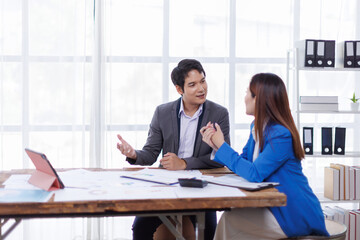 Team of Accounting business are calculating income-expenditure and analyzing real estate investment data on tablet computer, Financial and tax systems concept.
