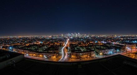 Naklejka premium Night Cityscape with Starry Sky