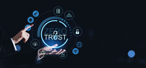 Zero trust cybersecurity concept with glowing data security icons and businessman hands on dark creative background.